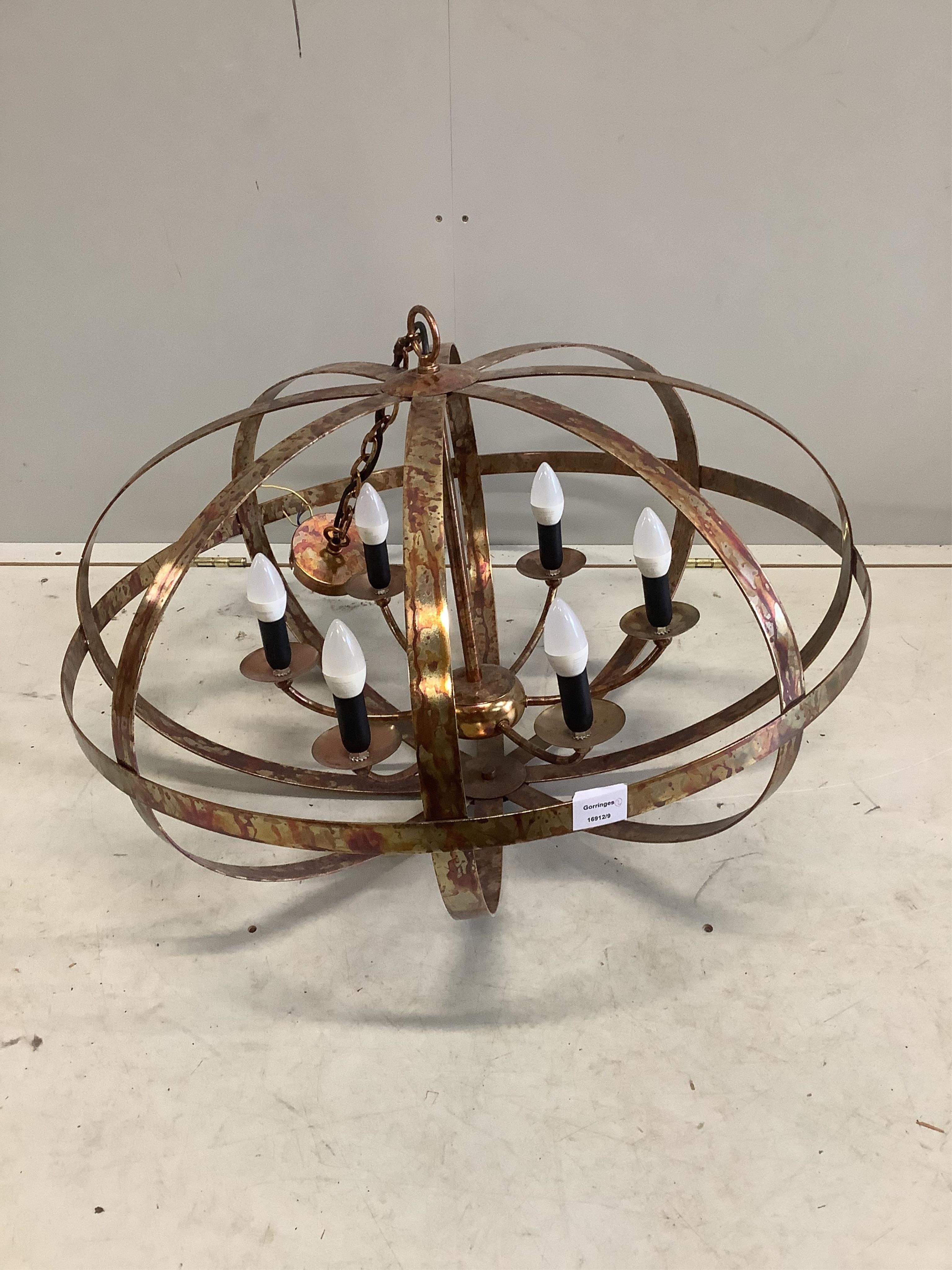 Two large Contemporary metal chandeliers, larger diameter 80cm. Condition - good